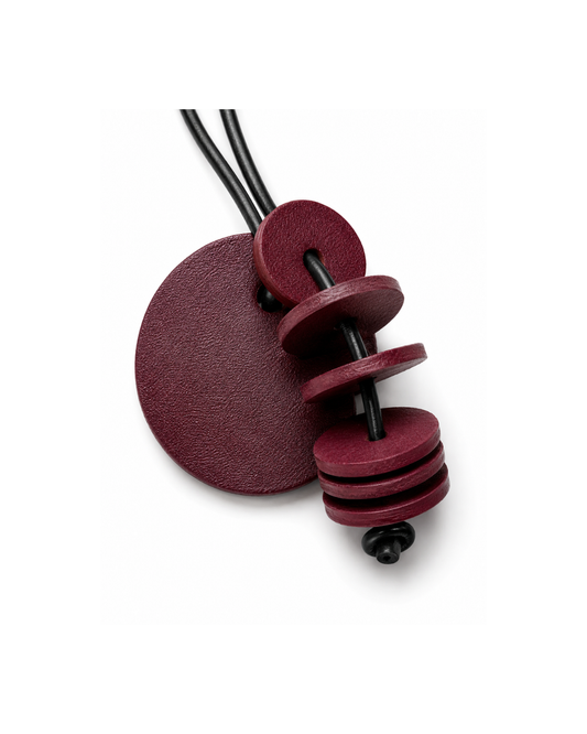 Wine Motion Leather Accessory Sleek geometry, fluid transformation.