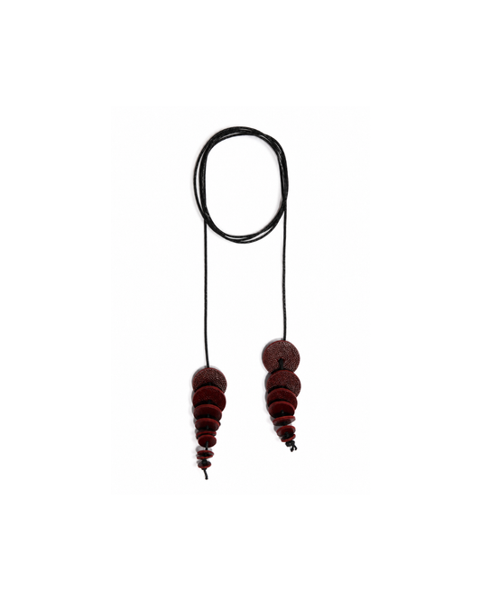 Wine Cascade Leather Accessory  Bold geometry, endless versatility.